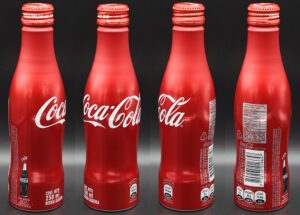 Coca-Cola / 100 Years Of Contour Bottle / Red Image