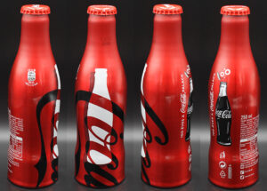 Coca-Cola / 100 Years Of Contour Bottle / White Bottle Image