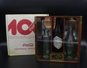 Coca-Cola / Glass Bottles / 100 Centennial Celebration Display Case Image