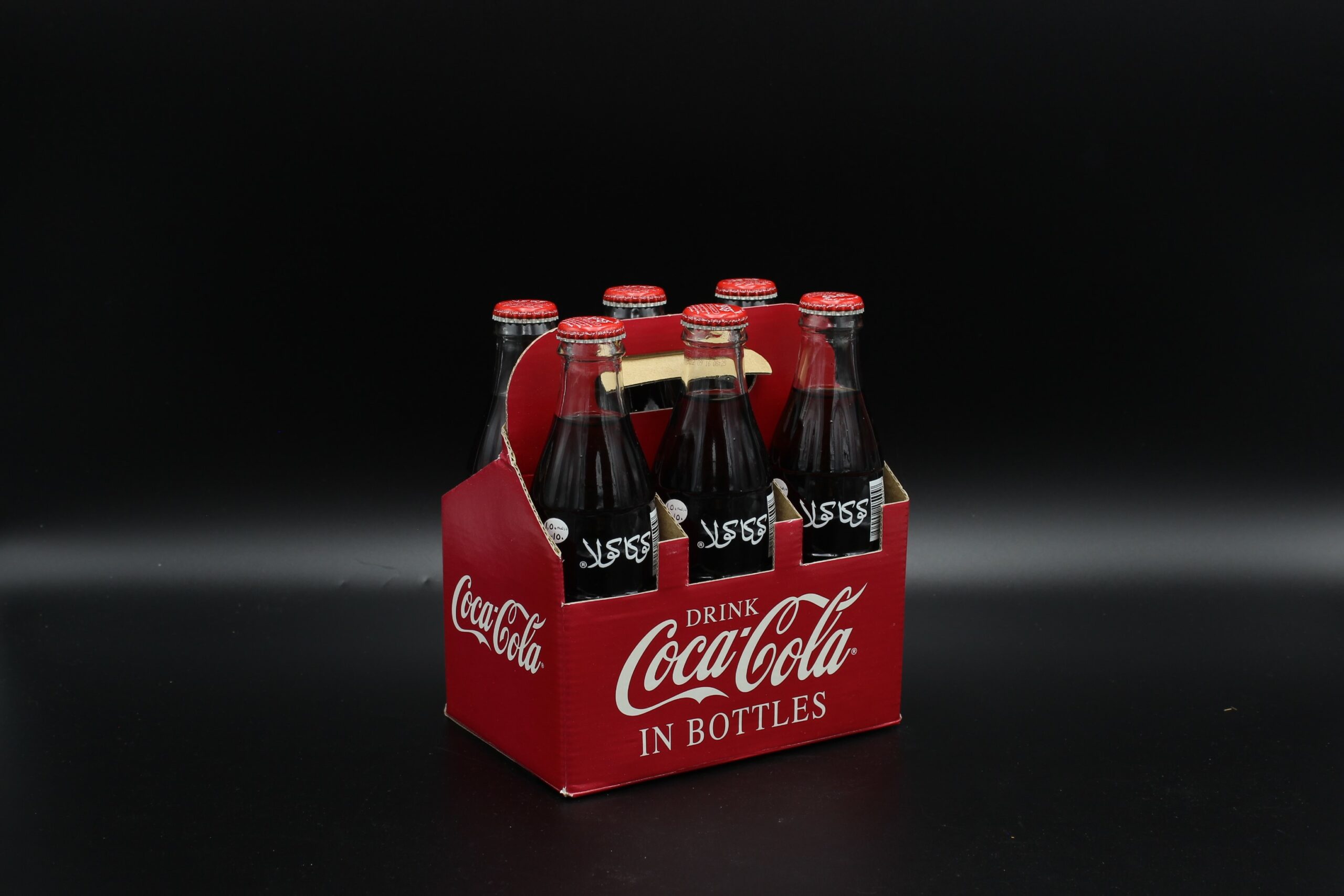 Coca-Cola / 6 Pack / Drink Coca-Cola In Bottles Image