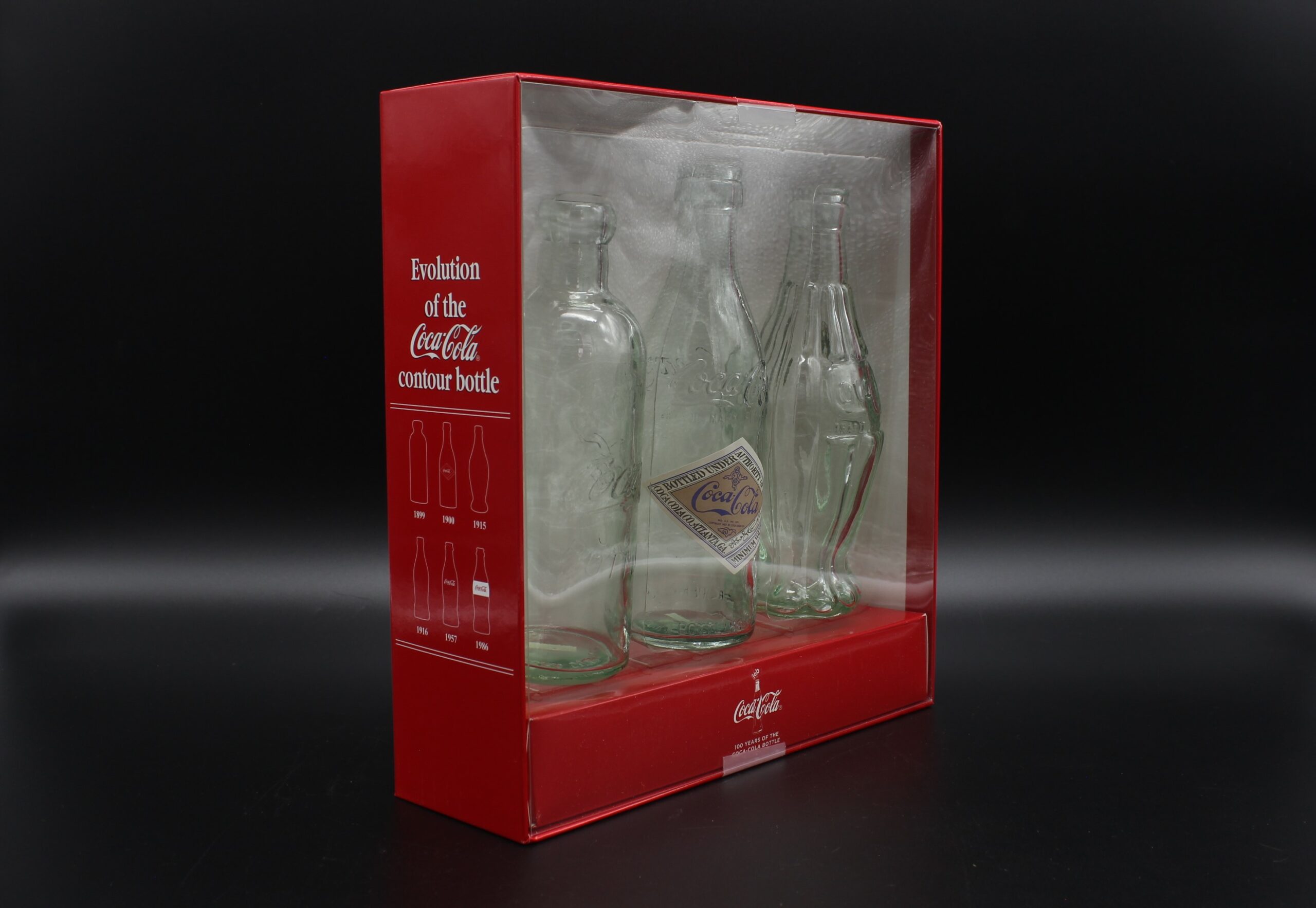 Coca-Cola / Glass Bottles / Evolution Of The Contour Bottle Image