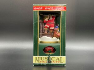 Coca-Cola / Musical Collection / Santa On Stairs Image