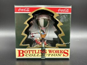 Coca-Cola / Brand Ornaments / Bottling Works Collection / North Pole Flying School Image