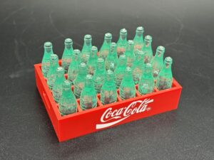 Coca-Cola / Plastic Mini Bottles in Red Plastic Crate Image