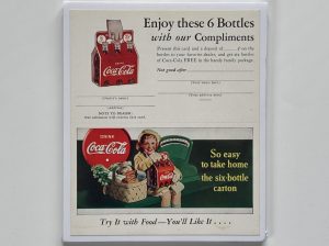 Coca-Cola / 6-Pack Coupon / Try It With Food / Paper Sign Image