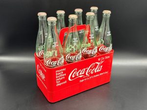 Coca-Cola / 8 Pack / Plastic Carrier / 16 Oz. Size / Money Back Image