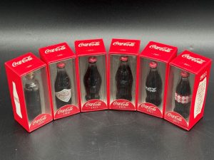 Coca-Cola / 1899 - 2011 Mini Bottles / Set Of 6 Image